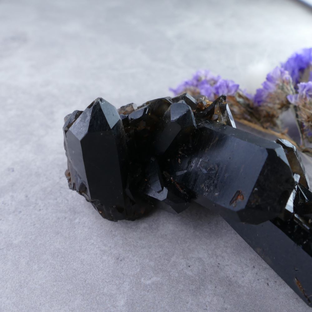Unleash Inner Strength with Dumi's Crystals (94g). Black Quartz Cluster (2.8cm x 7.8cm x 5cm). Deep beauty & amplified properties for a captivating & powerful crystal companion.