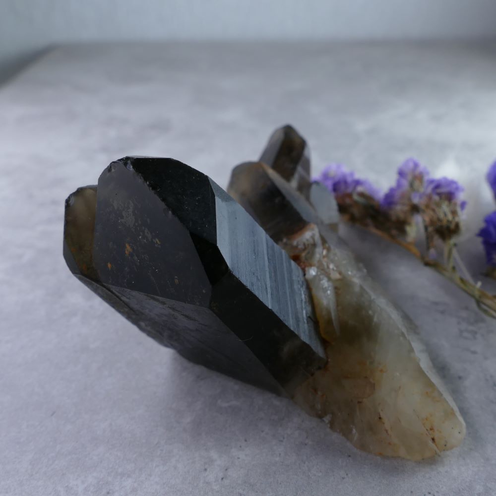 Smoky Quartz for Crystal Enthusiasts (127g). Dumi's Crystals Cluster (4.5cm x 7.5cm x 4cm). Deep smoky hues & amplified properties. A powerful tool for grounding & spiritual development.