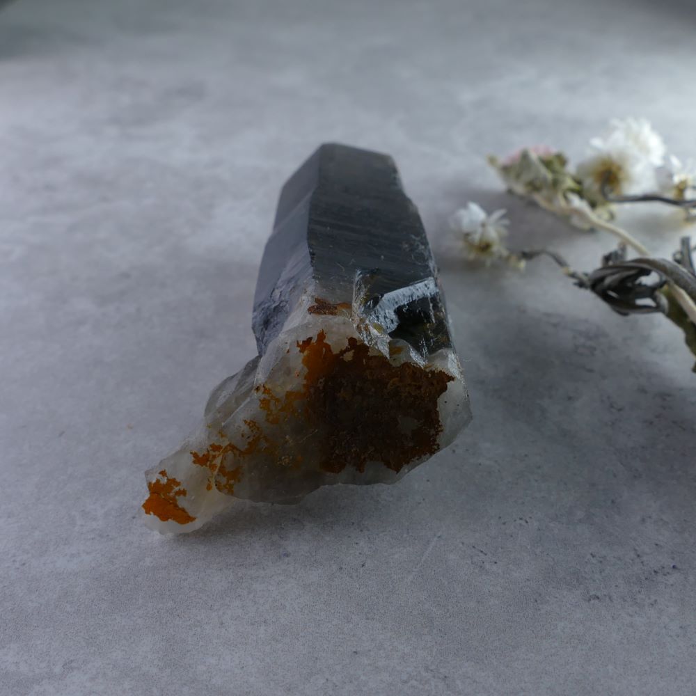 Dumi's Crystals - Irradiated Smoky Quartz Cluster (96g). Unique elongated shape (2.3cm x 8.3cm x 3cm) with deep smoky hues & amplified energy. A grounding & protective crystal companion.