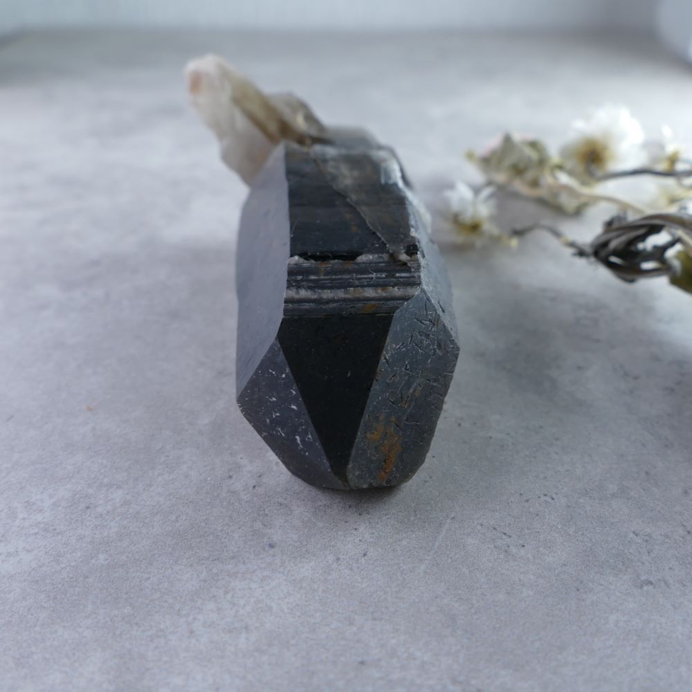 Must-Have for Crystal Enthusiasts! Dumi's Crystals (96g). Irradiated Smoky Quartz Cluster (2.3cm x 8.3cm x 3cm). Captivating presence with smoky hues & amplified energy for grounding, protection, & self-discovery.