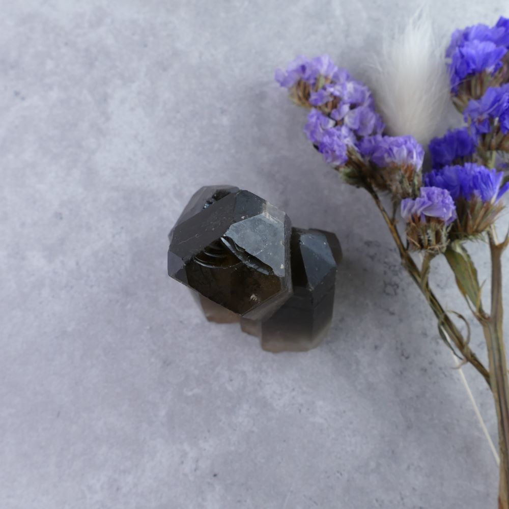 Crystal Healing Companion - Dumi's Crystals (76g). Slender Smoky Quartz Cluster (6cm) in rich hues. Comfortable for holding & promotes grounding energy.