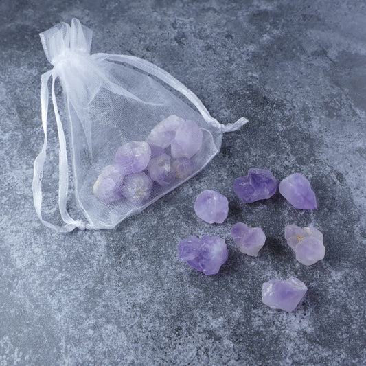 Dumi's Crystals Amethyst Flower Chips Pouch: 20 grams of genuine Amethyst Flower chips in a delicate organza pouch. Perfect for meditation, crystal grids, or carrying for tranquillity and spiritual growth.