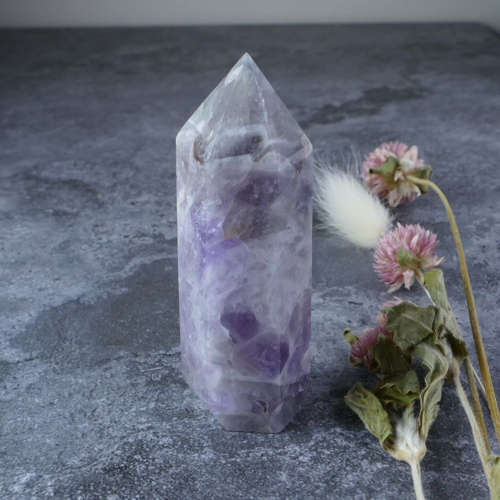 Sleek Amethyst and Quartz crystal tower (7.6cm) promotes healing, balance, and spiritual growth.