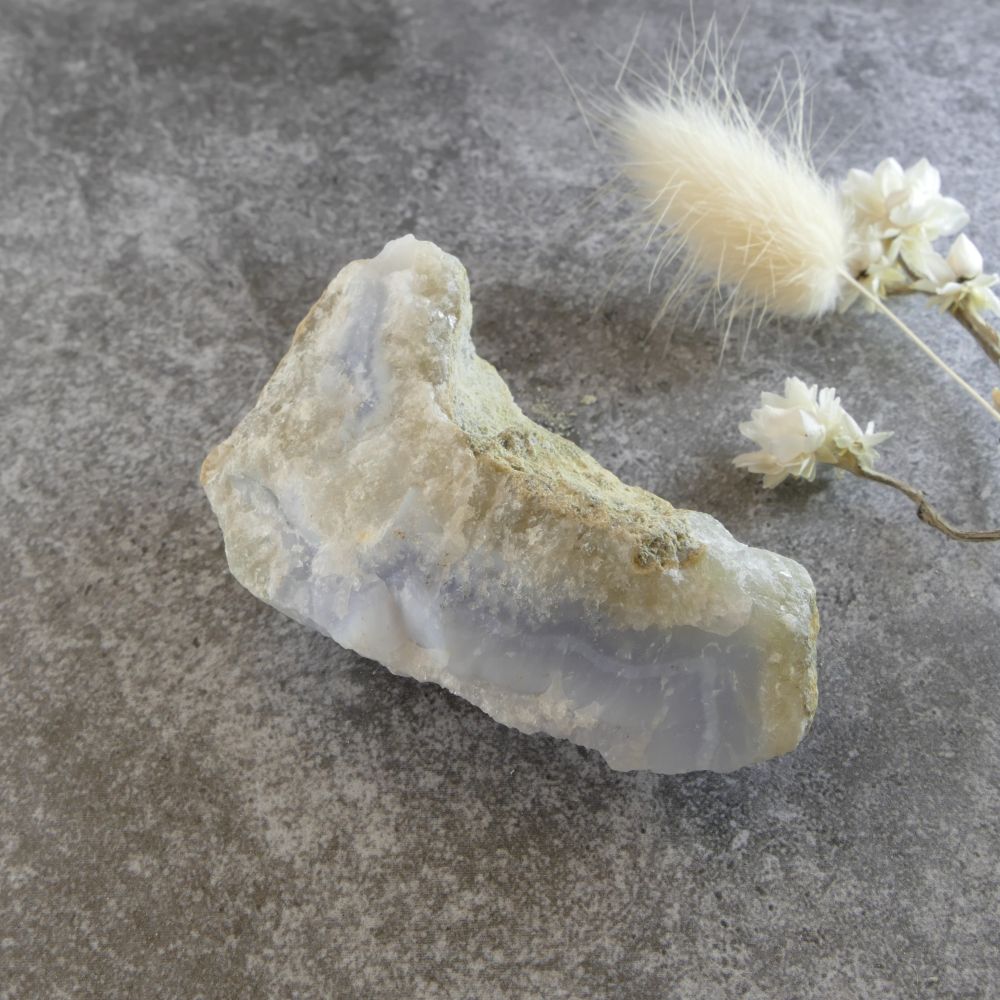 A 60g natural blue lace agate and quartz crystal piece, showcasing the calming blue hues and natural quartz sparkle. Ideal for home decor, meditation, or as a gift for crystal enthusiasts.