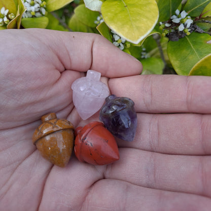 Hold Love in Your Hand: Dumi's Rose Quartz Acorn Carving (26x20mm) radiates compassion & fosters emotional healing.