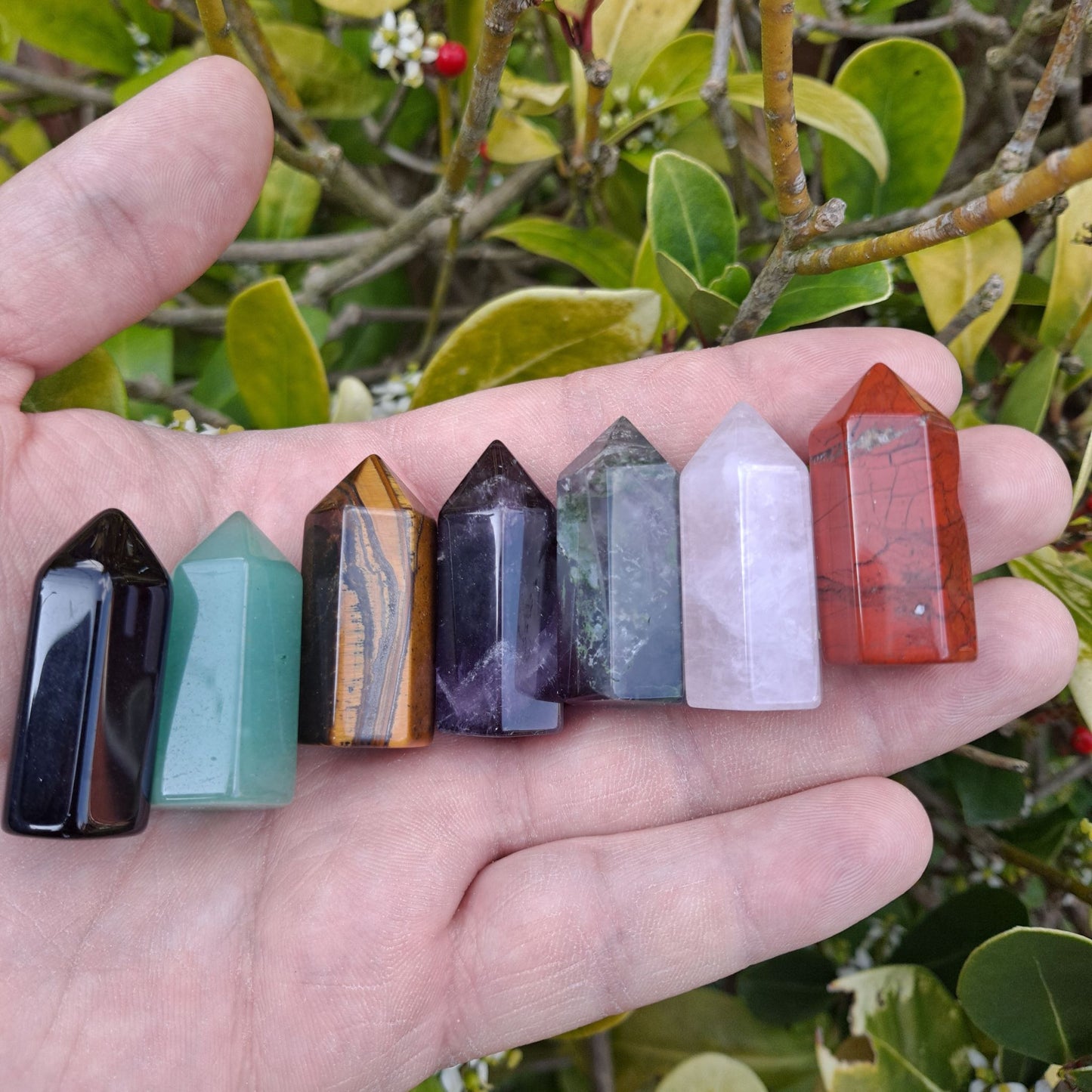 Unleash Inner Peace: Dumi's Crystals Amethyst Mini Tower radiates calming energy & gleams with deep purple hues.