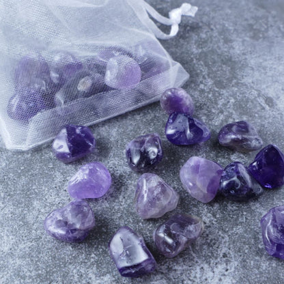 Dumi's Crystals | Dark Amethyst Chips (1-1.5cm) | Close-up of a collection of genuine Dark Amethyst chips, showcasing their deep purple hues and natural variations. Amethyst is revered for its calming energy and ability to promote stress relief, peace, and spiritual protection.