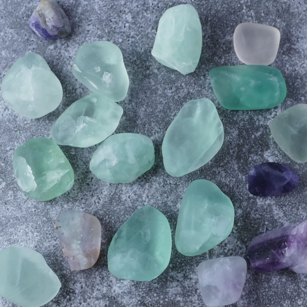 Dazzling Fluorite chips for focus & clarity (1-3cm) | Dumi's Crystals | Enhance your cognitive function, emotional well-being, and tap into your inner peace with these genuine Fluorite chips. Ranging from 1 to 3 centimeters, these chips promote mental sharpness, decision-making, and a sense of tranquillity.