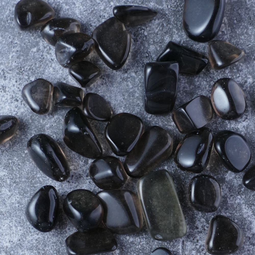 Dumi's Crystals | Ice Obsidian Chips (20g) | A collection of genuine Ice Obsidian chips, known for their mesmerizing icy sheen. Ice Obsidian is a powerful stone revered for its properties of protection, transformation, and inner strength.