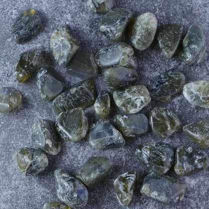 Dumi's Crystals | Labradorite Chips (20g) | A collection of genuine Labradorite chips, known for their captivating play of iridescent blues and greens. Labradorite is a powerful stone believed to promote transformation, intuition, and spiritual awareness.
