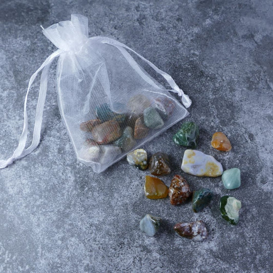 Dumi's Crystals | Ocean Jasper Chips Pouch (20g) | A luxurious organza pouch overflowing with Ocean Jasper chips, showcasing their captivating patterns and ocean-like hues. Ocean Jasper is known as a stone of emotional healing and tranquility, promoting peace, love, and a sense of connection.