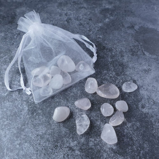 Dumi's Crystals | Rose Quartz Chips Pouch (20g) | A luxurious organza pouch overflowing with Rose Quartz chips in various shades of soft pink. Rose Quartz is known as the Stone of Unconditional Love, promoting love, emotional healing, and inner peace.