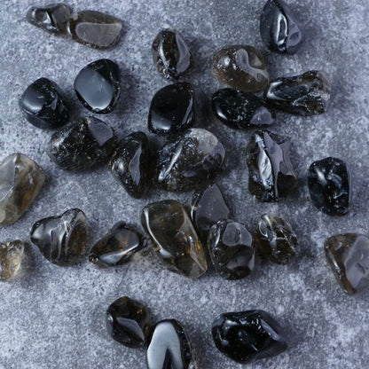  Smoky quartz chips for peace & clarity (1-2.5cm) | Dumi's Crystals | Enhance your emotional well-being and mental clarity with these genuine Smoky Quartz chips. Ranging from 1 to 2.5 centimeters, these chips promote emotional balance, a grounded spirit, and a shield against negativity.