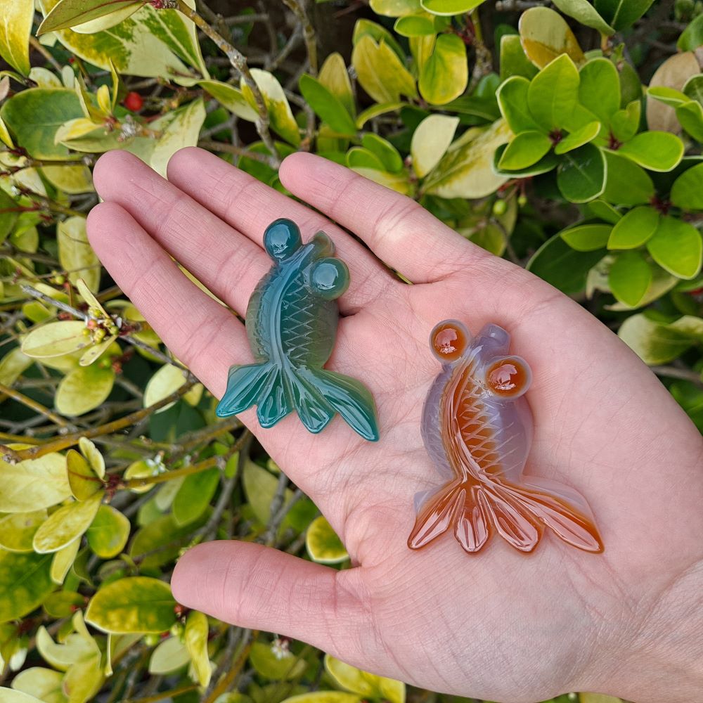 A School of Serenity: Dumi's Crystals Agate Goldfish Carvings, each radiating peace, balance, and positive energy.