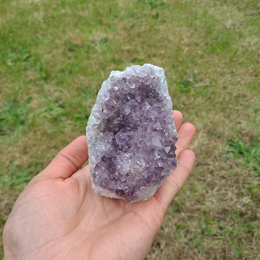 Dumi's Crystals | Lavender Amethyst Cluster (8.9 x 6.3 x 6.3cm) | A captivating Lavender Amethyst Cluster, showcasing its mesmerizing hues of soft lavender and delicate purple. This crystal is believed to promote peace, intuition, and spiritual awareness.