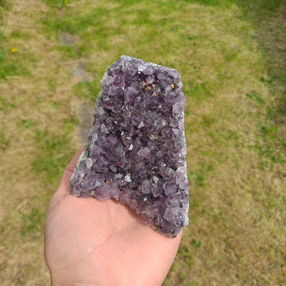 Dumi's Crystals | Amethyst Cluster (Portable, 8.9cm) resting in palm | This Amethyst Cluster (8.9 x 6.3 x 8.9cm) rests comfortably in your open palm, radiating calming energy