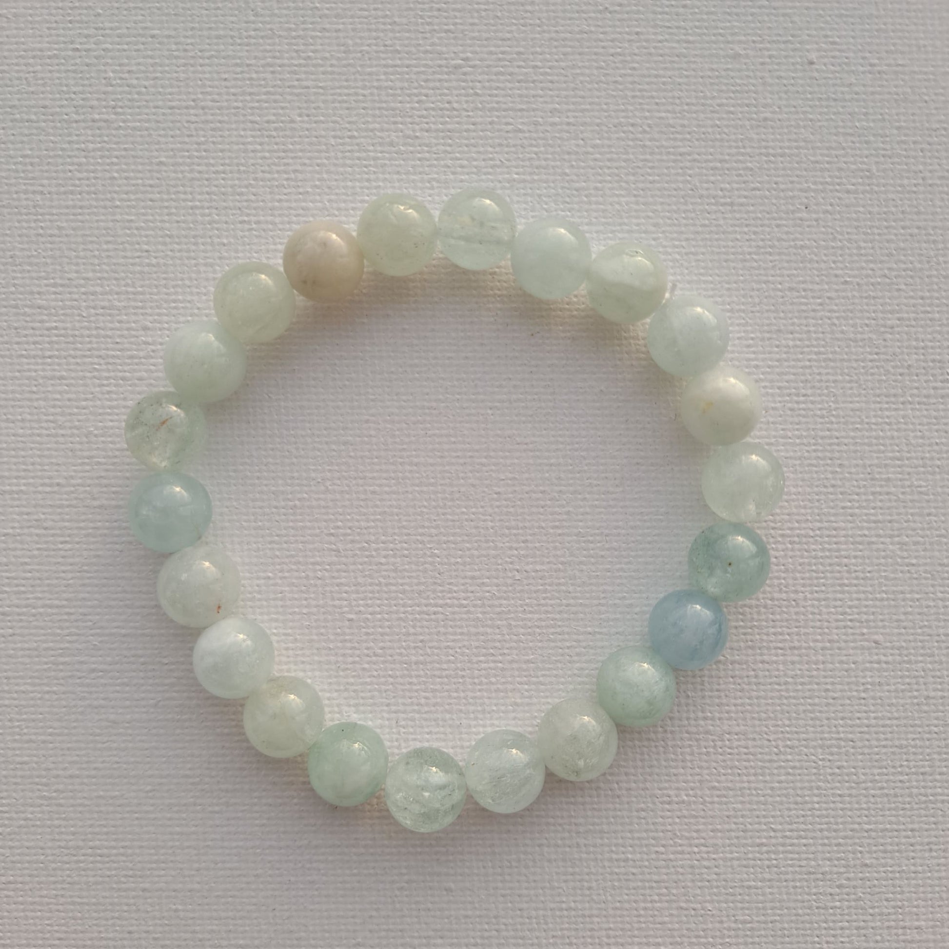 Dumi's Crystals: 8mm Aquamarine Bracelet. Soothing ocean vibes for emotional balance, clear thinking & self-expression. 