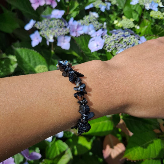 Dumi's Crystals | Black Onyx Stretch Bracelet | Showcasing the deep black luster and timeless elegance of Black Onyx on a wrist. This bracelet is known for its grounding energy, protection, and empowering properties.