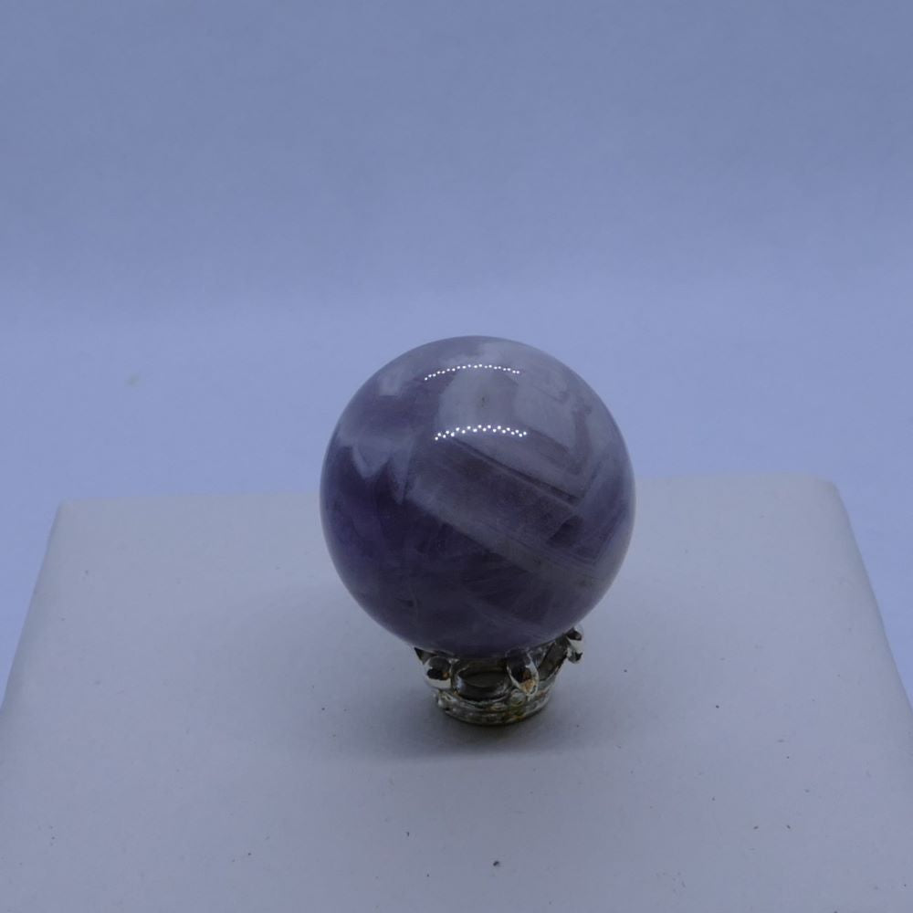 purple dream amethyst mini sphere on a crown stand and white background, seller is dumi's crystals