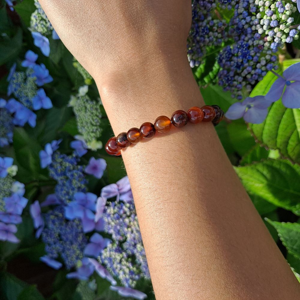 Dumi's Crystals | Dream Agate Stretch Bracelet (7 Inch) | Showcasing the captivating beauty of Dream Agate on a wrist. This bracelet features genuine Dream Agate beads, known for promoting intuition, lucid dreaming, and spiritual exploration.