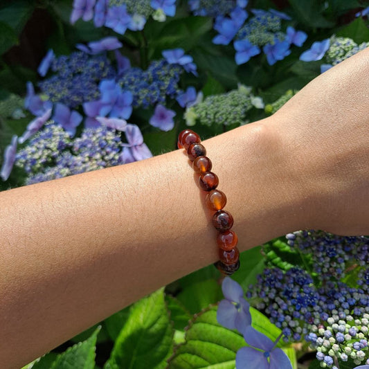 Dumi's Crystals | Dream Agate Stretch Bracelet (7 Inch) | Showcasing the captivating beauty of Dream Agate on a wrist. This bracelet features genuine Dream Agate beads, known for promoting intuition, lucid dreaming, and spiritual exploration.