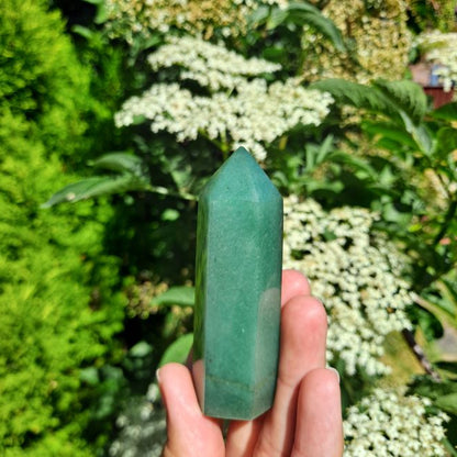 Cultivate Abundance with Green Aventurine Tower | Dumi's Crystals | This Green Aventurine Tower (7-9cm) radiates a sense of balance and prosperity. Green Aventurine is thought to attract good fortune, promote emotional healing, and foster a positive outlook.