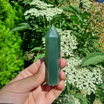 Dumi's Crystals | Green Aventurine Tower (7-9cm) | A close-up view of a captivating Green Aventurine Tower (7-9cm), showcasing its mesmerizing hues of green and intricate patterns. This crystal is believed to attract abundance, prosperity & promote emotional healing.