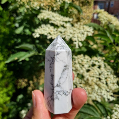 Enhance your crystal collection or create a tranquil space with Howlite Towers (6-9cm) | Dumi's Crystals | Available in three sizes for meditation, relaxation, or promoting spiritual connection. Howlite is thought to ease anxieties, improve sleep, and activate your crown chakra.