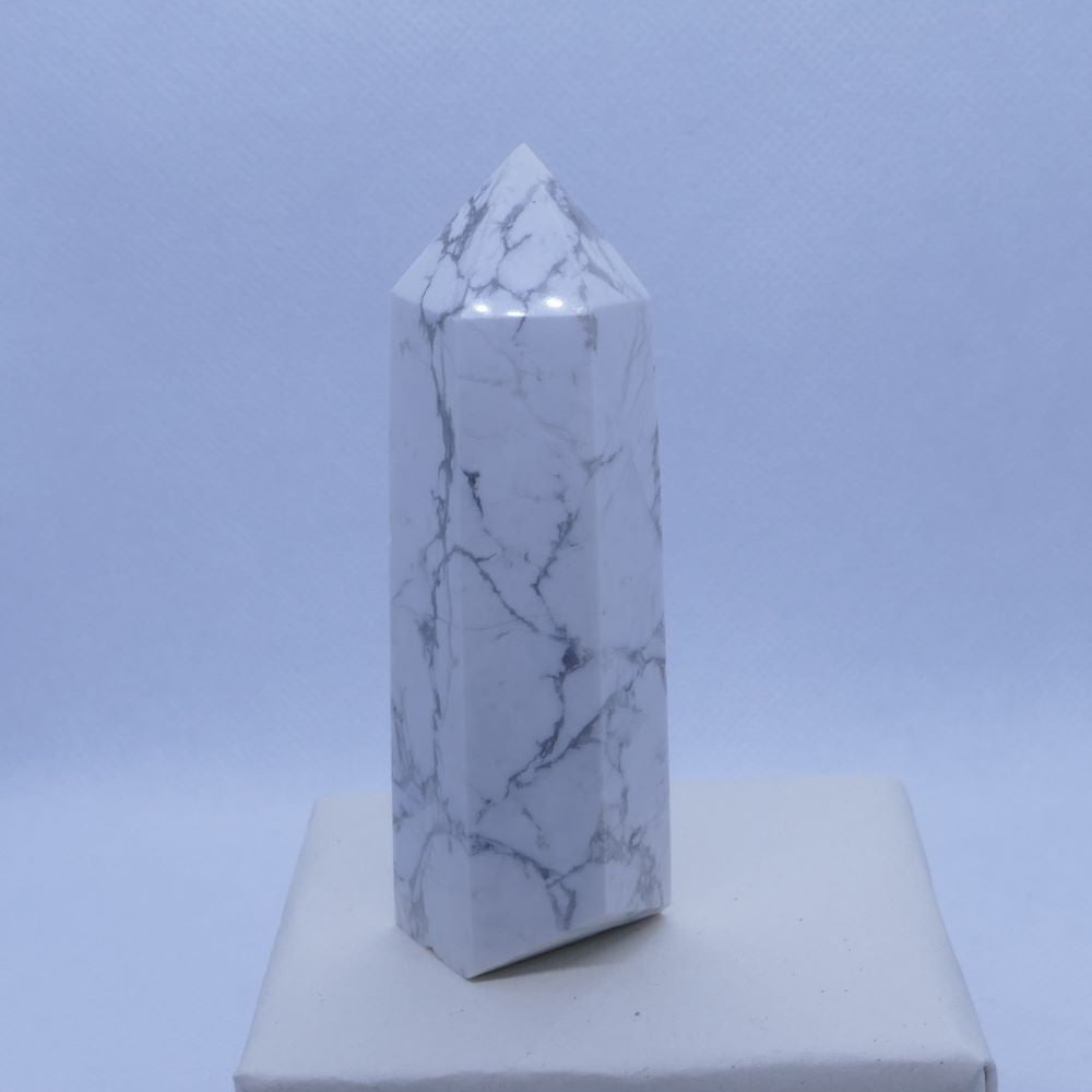 Spiritual Connection: Dumi's Crystals Howlite Tower. Howlite, with its calming energy, opens the mind to spiritual attunement and prepares you for receiving wisdom and insights.