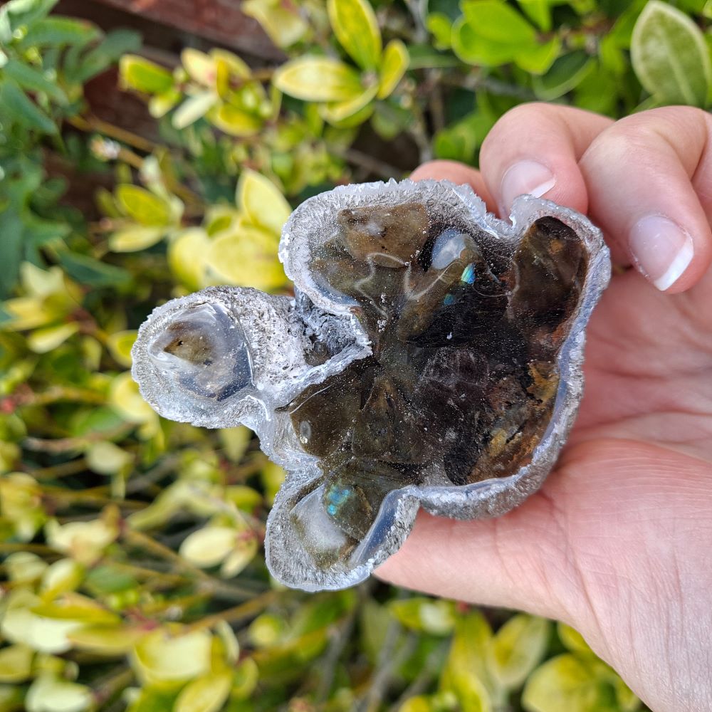 Dazzling Labradorite crystal Poodle. Ethically sourced crystals bring beauty and positive energy to your space.