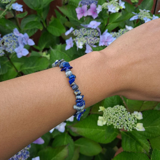 Dumi's Crystals | Lapis Lazuli Stretch Bracelet (Chip Beads) | Showcasing the captivating beauty of Lapis Lazuli on a wrist. This bracelet features a mesmerizing blend of deep blue hues and golden flecks, promoting wisdom, inner peace, and mental focus.