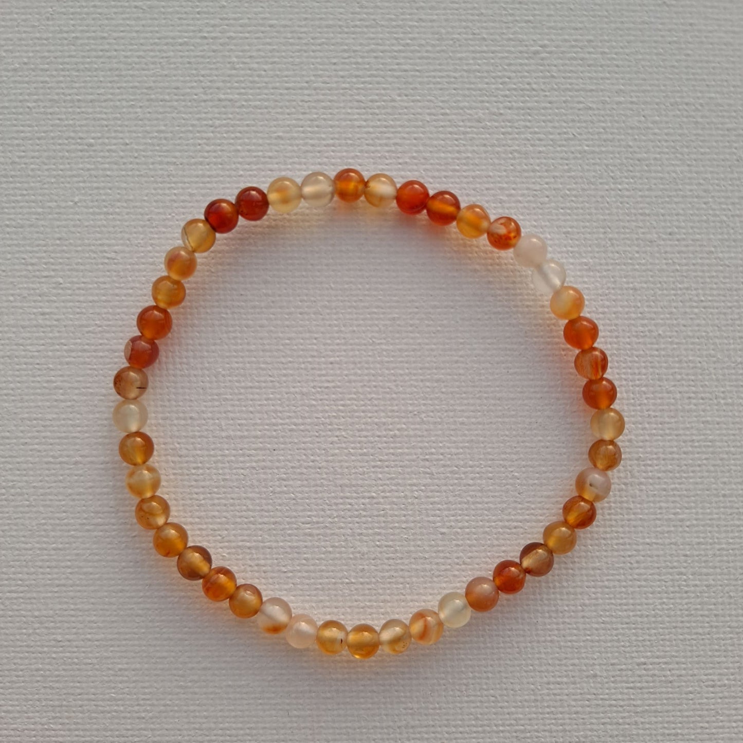 Dumi's Crystals Carnelian Bracelet (4mm). Unleash your inner fire with Carnelian (deep red). Promotes confidence, motivation & success. 