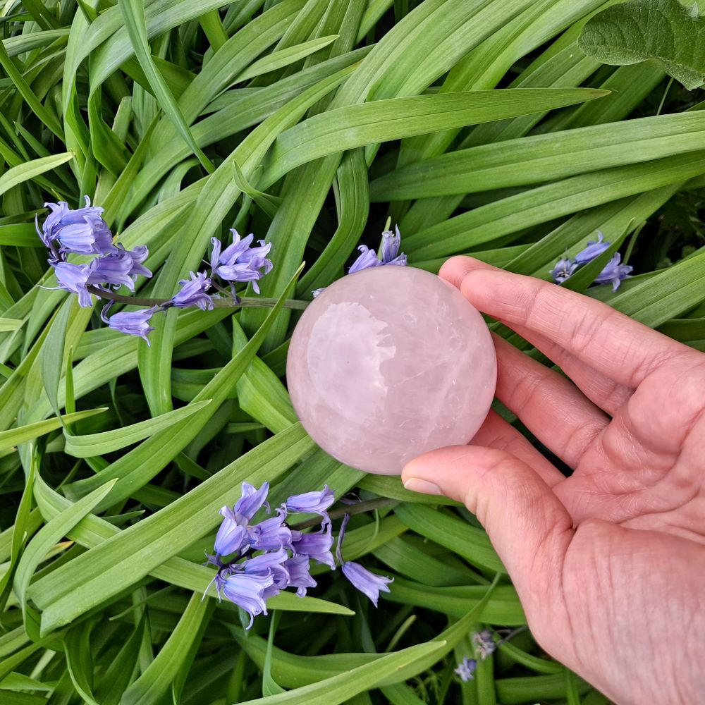 Unleash the Power of Love | Rose Quartz Sphere (2.5 inch) | Dumi's Crystals | This stunning 2.5-inch Rose Quartz Sphere is a powerful tool for fostering love, self-acceptance, and profound emotional healing.