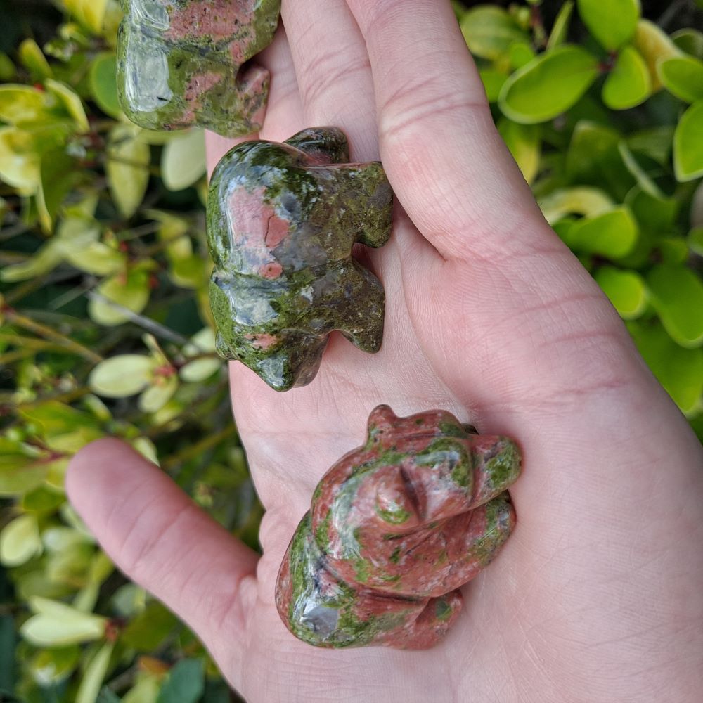 Dumi's Crystals | Unakite Crystal Bears (Love & Forgiveness): A collection of Unakite Crystal Bear Carvings, reminders of self-love & compassion. Unakite promotes emotional balance, healing & spiritual growth. Scatter them in your home or workspace to cultivate a loving environment, welcome peace & radiate joy. Embrace the power of Unakite from Dumi's Crystals!