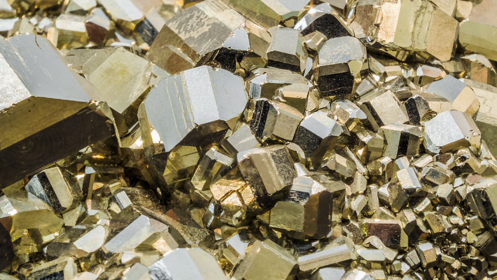 image of pyrite: dumi's crystals blog post about pyrite's meaning, benefits, healing properties and more
