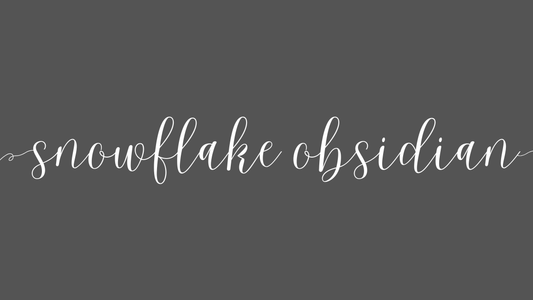 the word snowflake obsidian on dark grey background