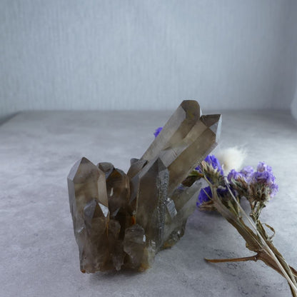 Natural Smoky Quartz Beauty - Dumi's Crystals Cluster (6.2cm x 5.8cm x 4.3cm). Captivating smoky quartz crystals (122g) radiate positive transformation energy.