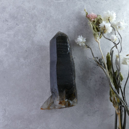 Dumi's Crystals Irradiated Smoky Quartz Cluster (96g) - Amplified Power! Elongated form (2.3cm x 8.3cm x 3cm) in smoky hues. Grounding & protective crystal for healing.