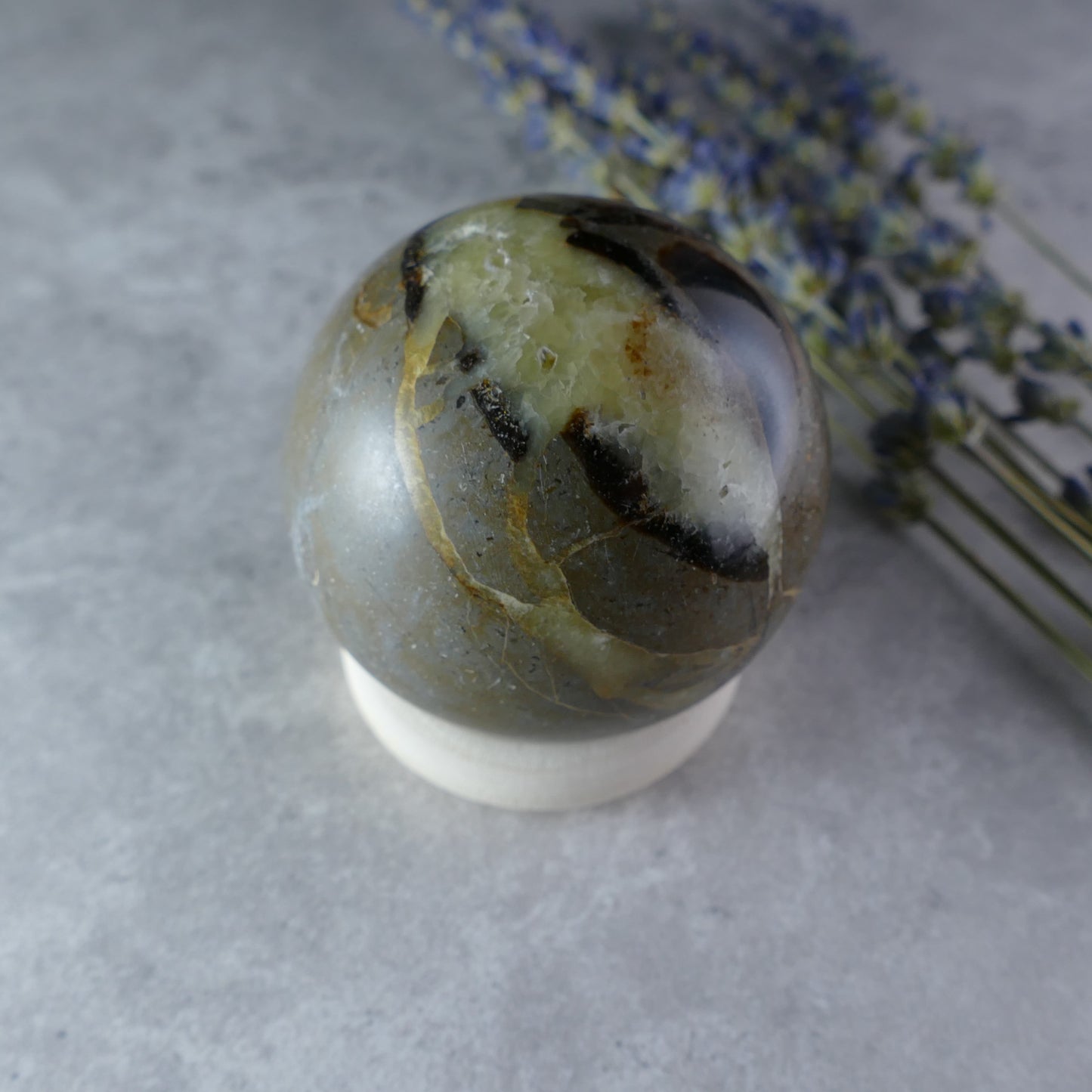 Whispers of the Earth - Dumi's Crystals Septarian Sphere (52mm, 187g). Golden calcite, brown aragonite, and grey limestone in captivating patterns tell the story of the Earth.  