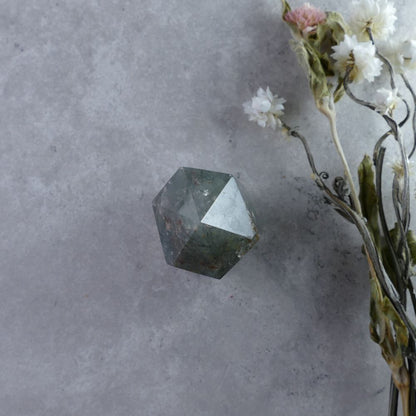 Pocket-Sized Power - Dumi's Crystals Garden Quartz Tower (4.9cm). Captivating miniature (2.7cm x 2.7cm) with surprising weight (59g). A crystal companion for anywhere.