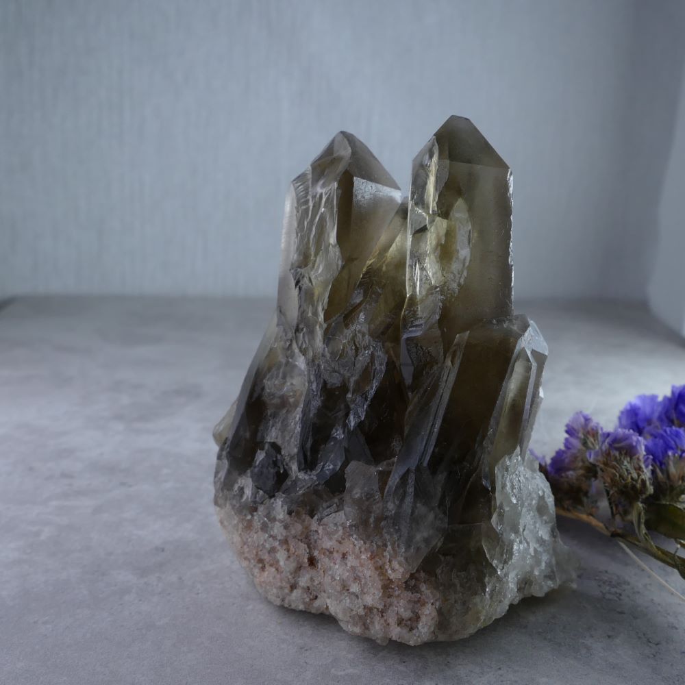 Grounding Sanctuary - Dumi's Crystals Smoky Quartz Cluster (206g). Smoky pillar formation (8cm tall) exudes calming energy. Ideal for meditation & crystal healing.