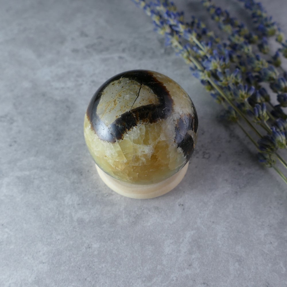 Dumi's Crystals Mini Septarian Sphere (43mm, 110g) - Earth's Calming Comfort! Carry peace with you. Golden calcite, aragonite & limestone in captivating patterns promote well-being on-the-go.