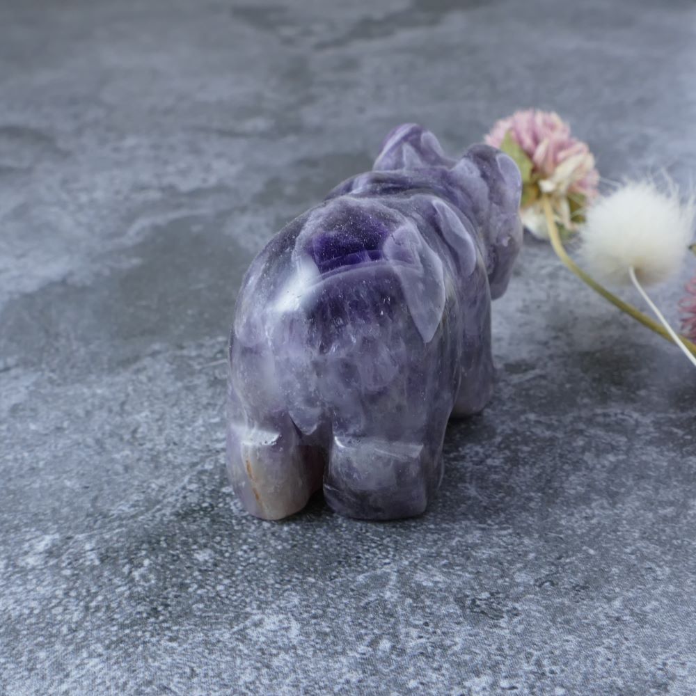 Carry the calming energy of Amethyst with you wherever you go with this charming 2-inch Chevron Amethyst bear carving. 