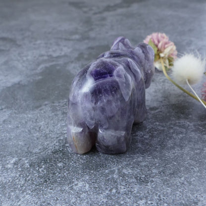 Carry the calming energy of Amethyst with you wherever you go with this charming 2-inch Chevron Amethyst bear carving. 