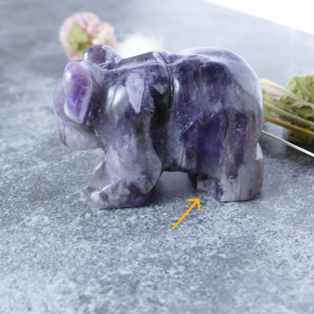Sparkling Chevron Amethyst bear carving, a natural gemstone believed to promote inner peace and spiritual awareness. 
