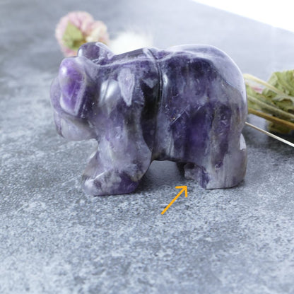 Sparkling Chevron Amethyst bear carving, a natural gemstone believed to promote inner peace and spiritual awareness. 