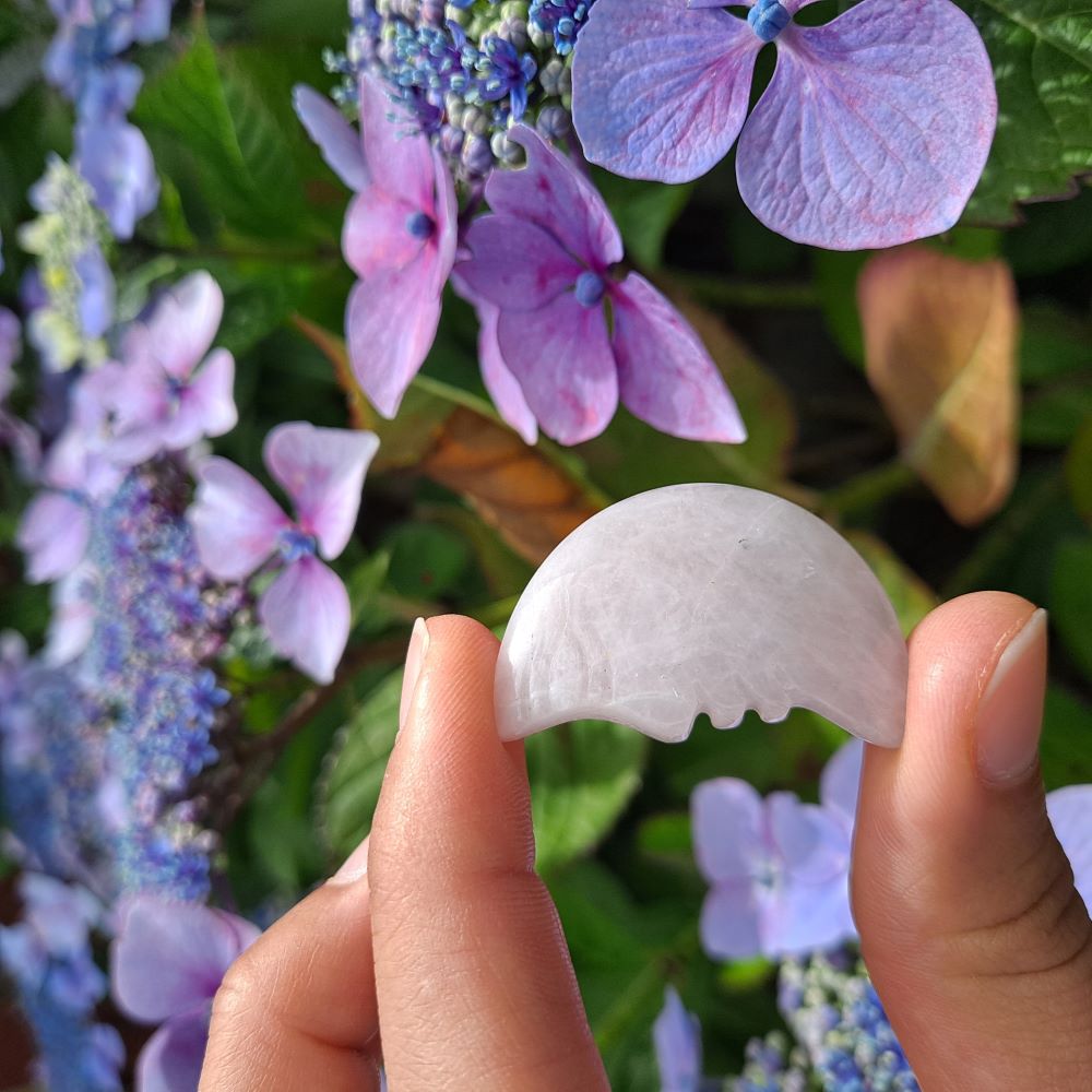 Dumi's Crystals Rose Quartz Moon Face Carving (34x20x8mm): Bathed in love's gentle light, this celestial charm promotes peace, healing & self-love. 