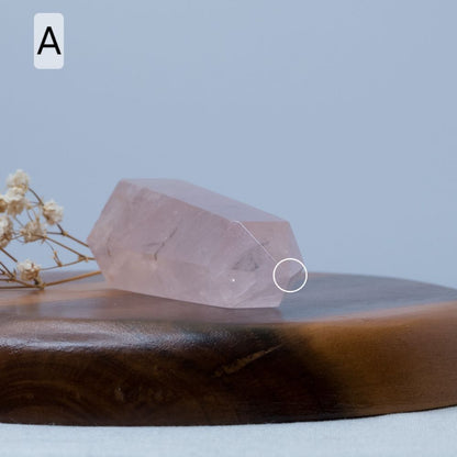Crystal on a wooden surface with a blurred background
