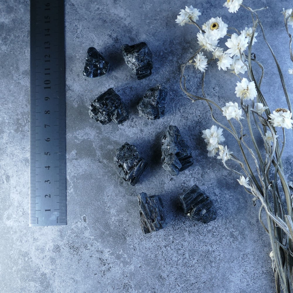 Black Tourmaline: Nature's Shield! Dumi's Crystals (5-10g, 10-20g; 1.5-3cm). Unique black stones with striations promote a sense of security and grounding.