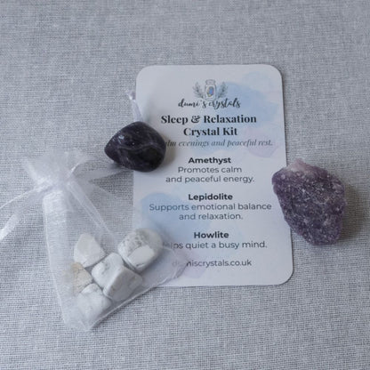 Sleep and relaxation crystal kit with stones and a card on a gray background